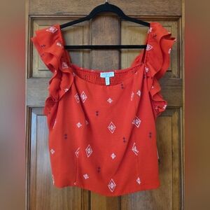 Sofia Vergeras Red Ruffled Blouse with Pattern